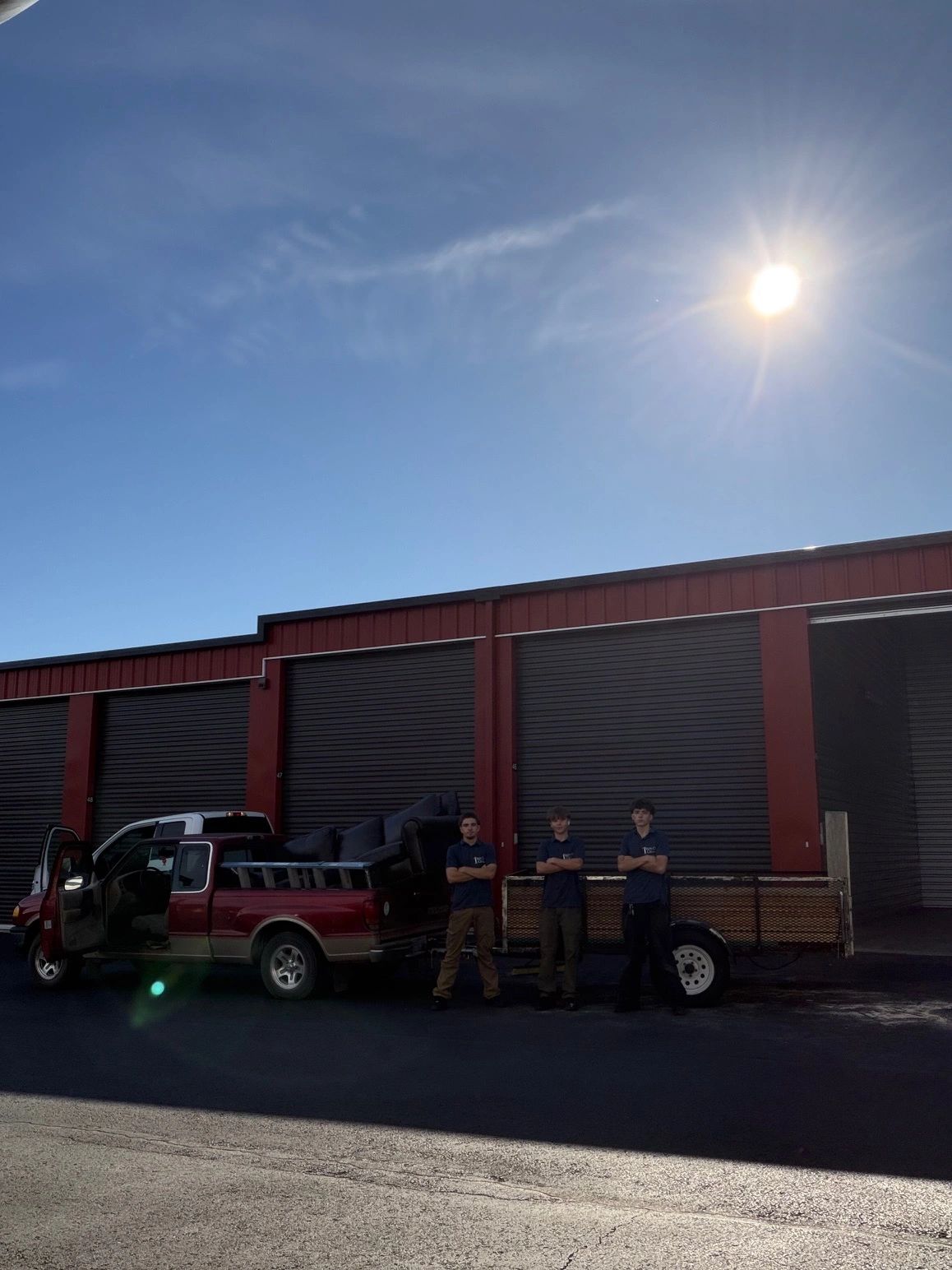 Ironclad Cleanup team with truck ready for junk removal